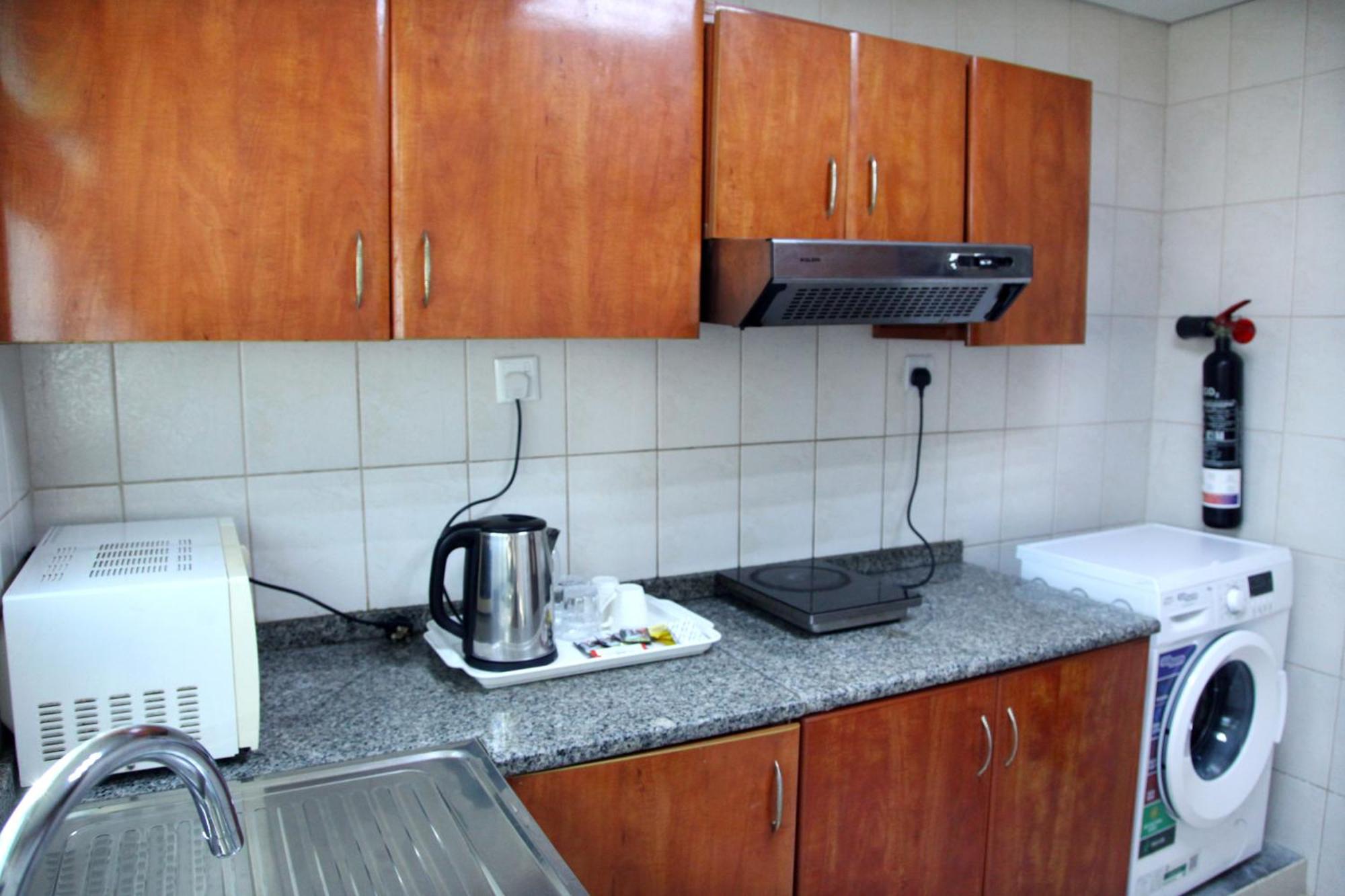 Ruwi Hotel Apartments, Шарджа Экстерьер фото